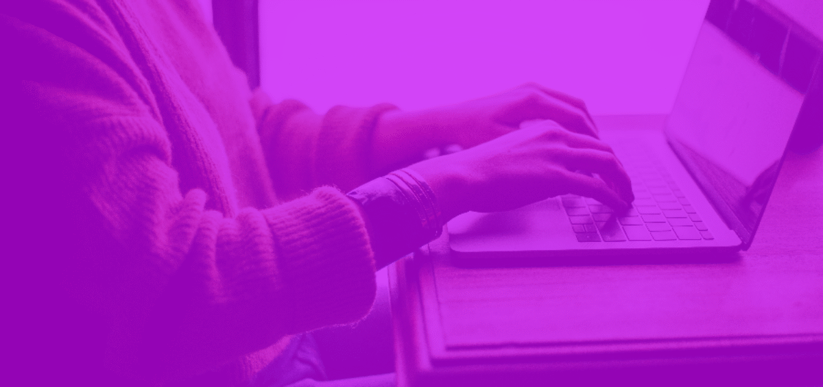 person on laptop with purple overlay