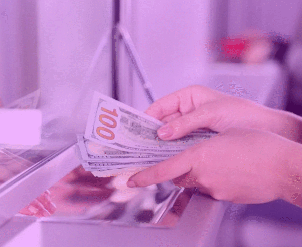 bank teller handing cash