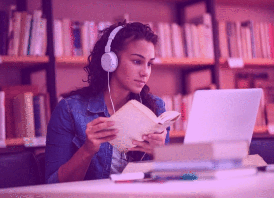 girl studying with book and laptop