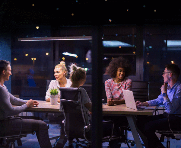 people in an office at night