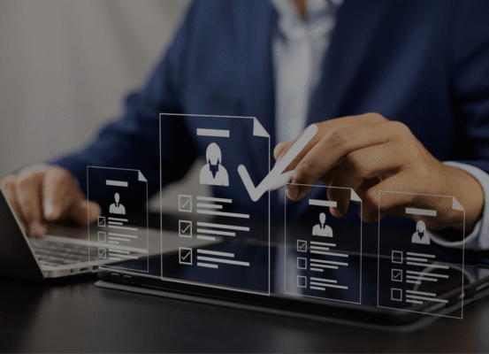 person looking at digital resumes