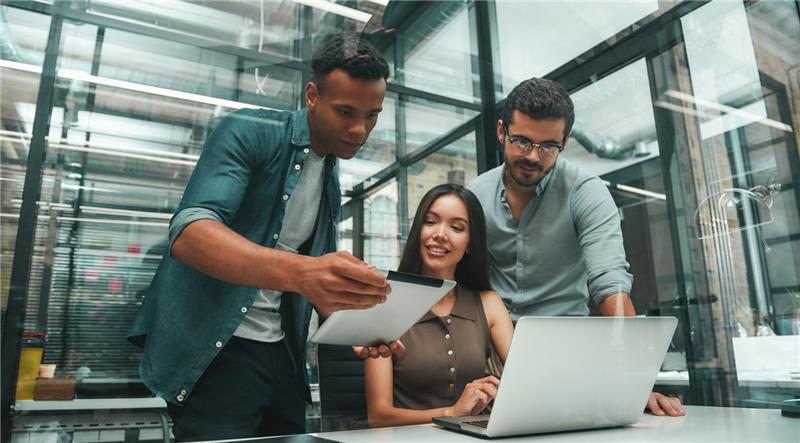 people looking at a computer screen